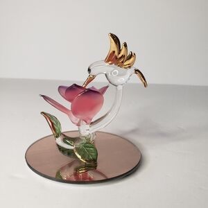 Vintage collectible glass hummingbird figurine handmade with pink flower. 116